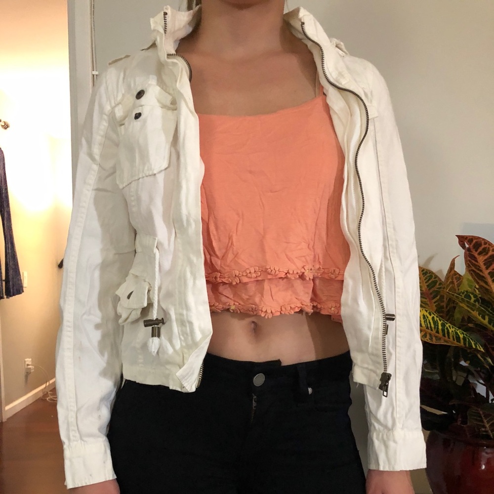 Coral top and white jacket